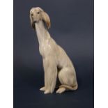 A Lladro model of a seated Afghan hound, 30cm tall approx