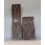 Two antique carved oak panels, both with scroll decoration, 70 and 42cm long respectively (2)