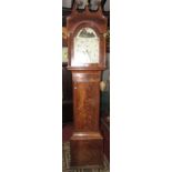 A Georgian mahogany longcase clock, the case with string inlaid detail, the hood with ionic