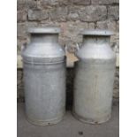 Two ex Cotteswold Dairy Ltd, Tewkesbury cast aluminium twin handled milk churns complete with caps