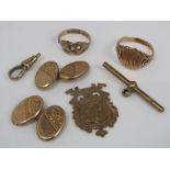 A collection of 9ct items comprising a pair of cufflinks engraved with floral decoration, a