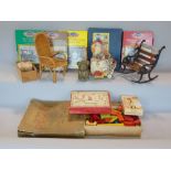 A box containing a collection of various vintage toys to include a pull along chicken and various