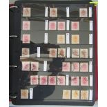 A folder containing a large collection of GB Commonwealth Orange Free States stamps, mint and