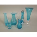 Six pieces of Bath Aqua glass to include jugs and vases, the largest 20 cm high (6)