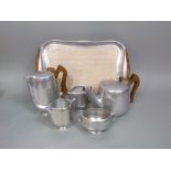 A Picquot Ware six piece cast pewter tea service, the tray 40 cm long