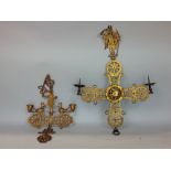 Two similar continental religious pierced brass hanging candelabra, mounted by biblical figures with