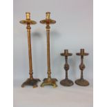 Large pair of 19th century gilt metal candlesticks with wrythen fluted stems and acanthus stepped