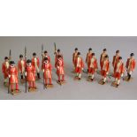 A lead collection of Yeoman of the Guard, four armed with pikes 6 cm high (with pikes 8 cm), 18 in