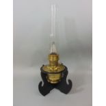 Brass Aladdin lamp model 23 with associated fretwork stand