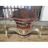 A small Georgian style cast iron fire basket, the serpentine front with pierced scrolling acanthus