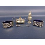 A mixed collection of cruet items to include a pair of late 19th century silver salts with pierced