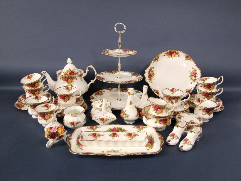 A collection of Royal Albert Old Country Roses pattern wares comprising three tier stand, tea pot,