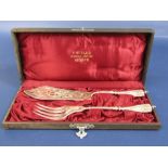 Continental 800 silver fish serving pair within original box, the knife blade pierced with a