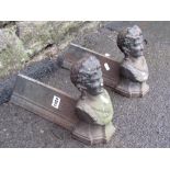 A pair of cast iron Chenets with female head and shoulder bust finials