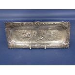 Late 19th century import silver pin tray, embossed with a hunting scene, with hounds and a stag,