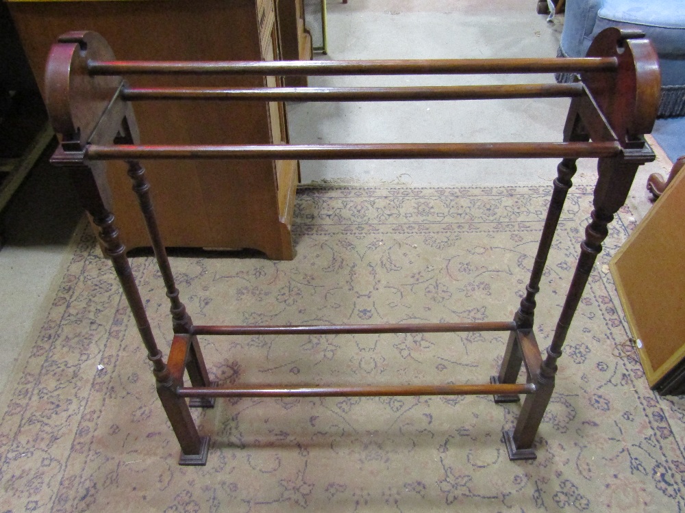 Good late 19th century oak and fruitwood towel rail, with carved rococo roundels