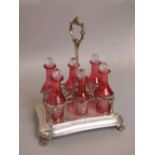 Good quality 19th century silver plated and cranberry glass bottle cruet stand, the lobed stand