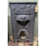 A reclaimed cast iron bedroom grate/insert with decorative organic Art Nouveau relief detail, 50