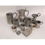 A mixed collection of antique and later pewter to include three tankards, a lidded baluster jug, a