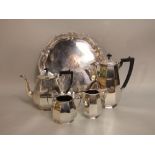 Art deco four piece faceted silver plated tea service together with a further silver plated salver