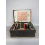 German cased nursery magic lantern with various slides, the box 32cm wide