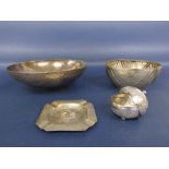 A collection of foreign white metal items to include two large bowls, ashtray embossed with a deer