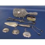A mixed collection of silver to include a silver dressing mirror, silver handled glove stretchers,