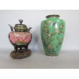 Japanese cloisonne twin handled baluster lidded pot, with panels of birds amidst branches in various