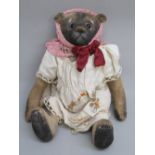 1940'S PERIOD ARTICULATED TEDDY BEAR WITH GLASS EYES (L: 34cm)
