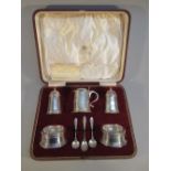 A SILVER CONDIMENT SET RETAILED BY EDWARD AND SONS LTD, GLASGOW, LONDON 1908 (363g), CASED