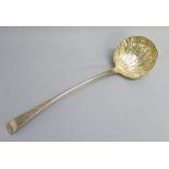 GEORGIAN SILVER SOUP LADLE WITH A SHELL FLUTED BOWL, BY THOMAS ELLIS (PROBABLY), LONDON 1768,
