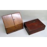 EDWARDIAN OAK STATIONERY BOX WITH A DOUBLE FOLDING FRONT DISCLOSING A FITTED INTERIOR, WITH A DRAWER