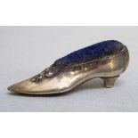 EDWARDIAN SILVER PIN CUSHION IN THE FORM OF A LADY'S SHOE, BY LEVI & SALAMAN, BIRMINGHAM 1907,