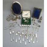 GOOD QUANTITY OF SILVER INCLUDING GEORGIAN AND LATER FLATWARE, PAIR OF SUGAR TONGS, FOUR OTHER PAIRS