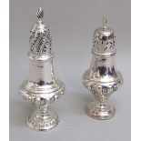 EDWARDIAN SILVER BALUSTER SUGAR CASTER WITH EMBOSSED DECORATION AND PIERCED DOMED COVER BY THOMAS