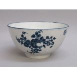 WORCESTER FIRST PERIOD BLUE AND WHITE FOOTED BOWL WITH FLORAL AND FRUIT DECORATION (H: 6.5cm, DIA: