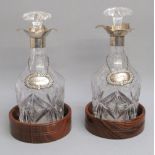 PAIR OF GEORGE VI SILVER MOUNTED CUT GLASS DECANTERS BY COOPER BROTHERS & SONS LTD, SHEFFIELD