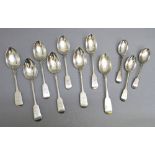 EIGHT GEORGIAN AND VICTORIAN FIDDLE PATTERN TABLESPOONS AND THREE DESSERT SPOONS, ALL MONOGRAMMED (