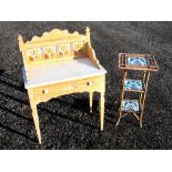EDWARDIAN PINE WASHSTAND WITH A FLORAL TILED, MARBLE TOP AND DRAWER, ON TAPERING LEGS (108cm x 75.
