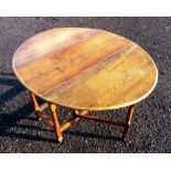 ANTIQUE OAK OVAL GATELEG TABLE WITH TWO LEAVES AND A LATER DRAWER, ON TURNED BALUSTER LEGS AND