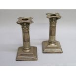 PAIR OF LATE VICTORIAN SILVER CORINTHIAN COLUMN CANDLESTICKS BY EDWARD HUTTON, LONDON 1891 (H: 14.