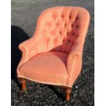 LATE VICTORIAN TUB SHAPED ARMCHAIR BUTTON UPHOLSTERED IN FLORAL APRICOT FABRIC, ON WALNUT TURNED