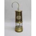 BRASS COALMINER'S LAMP WITH AN APPLIED EMBOSSED BRASS OVAL PLAQUE FOR 'FERNDALE COAL & MINING CO' (