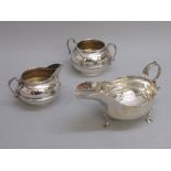 SILVER JUG AND SUGAR BOWL BY C B&S, LONDON 1933 TOGETHER WITH A SILVER GRAVY BOAT, LONDON 1907 (