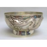 CHINESE SILVER CIRCULAR BOWL EMBOSSED WITH A CELESTIAL DRAGON, ON A RAISED CIRCULAR FOOT BY W.H (