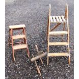 PAIR OF WOOD FOUR TREAD STEP LADDERS (H: 126cm CLOSED), SIMILAR PAIR OF STEP LADDERS AND A WOOD