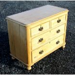 VICTORIAN PINE CHEST WITH TWO SHORT, TWO LONG DRAWERS, ON TURNED FEET AND CASTORS (76cm x 94.5cm x