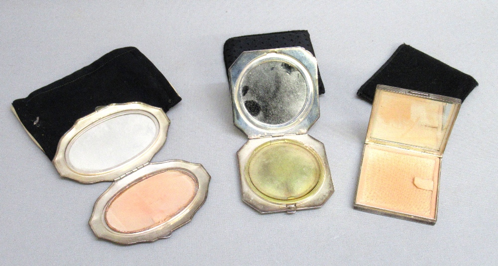 SILVER COMPACT BY CRISFORD & NORRIS LTD, BIRMINGHAM 1946 AND TWO OTHER SILVER COMPACTS (307g