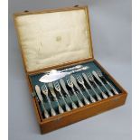 AN ART NOUVEAU GERMAN 800 STANDARD 26 PIECE FISH SET CANTEEN OF SILVER HANDLED CUTTLERY, THE