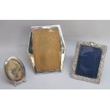 LATE VICTORIAN SILVER MOUNTED FLORAL AND SCROLL RECTANGULAR PHOTOGRAPH FRAME BY C A C, BIRMINGHAM